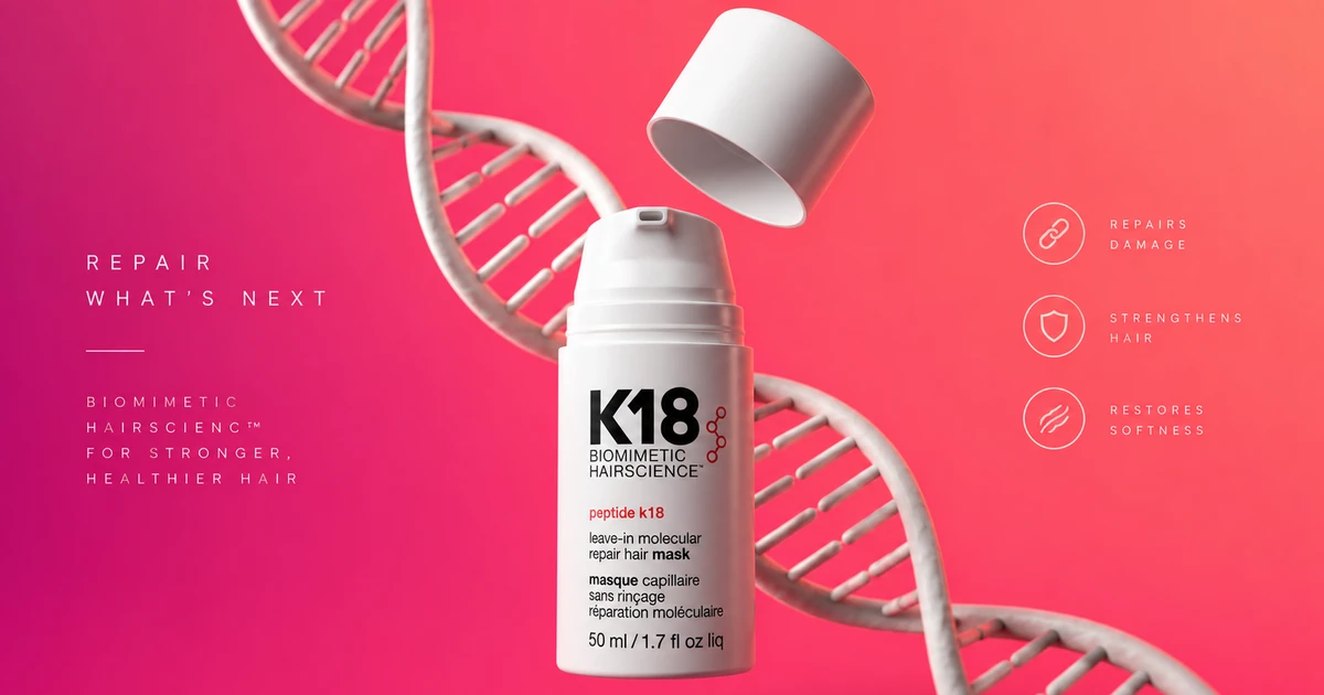 K18-behandling produktbilde med DNA-heliks og leave-in hårmaske mot rosa bakgrunn