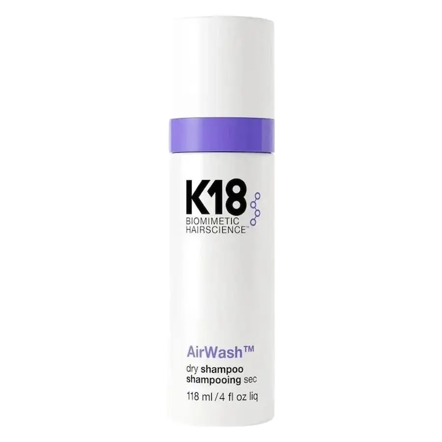 K18 AirWash tørrshampoo i 118 ml flaske med lilla band og hvit etikett på hvit bakgrunn
