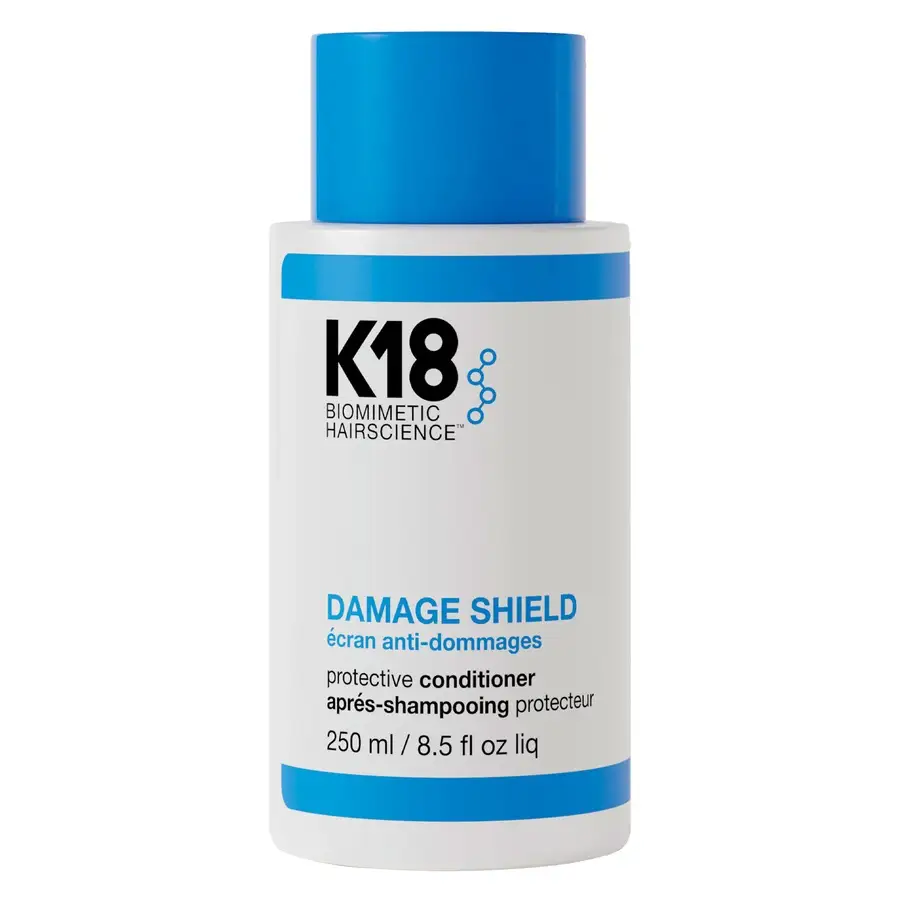 K18 Damage Shield Protective Conditioner 250ml - hvit flaske med blått lokk og etikett
