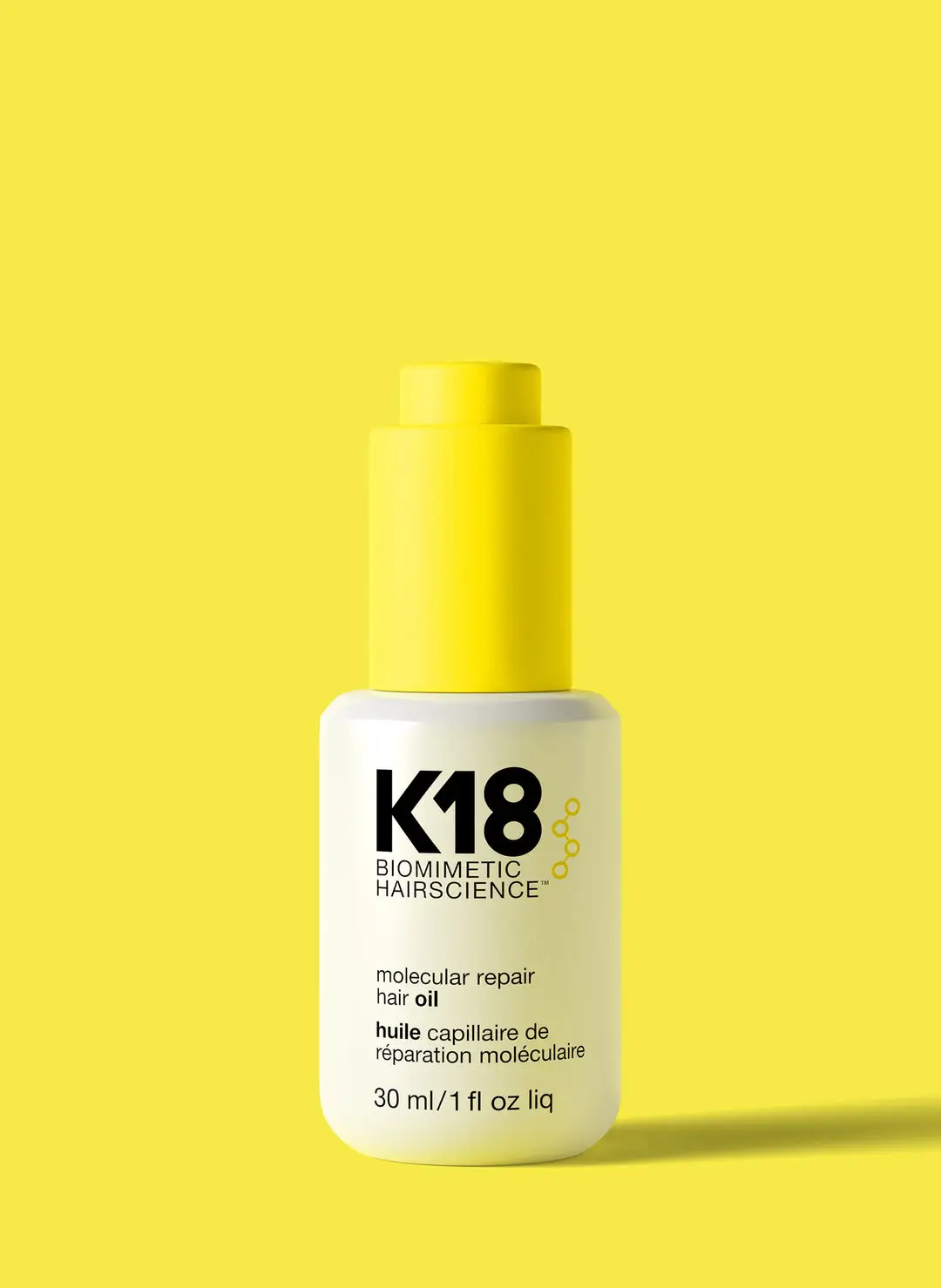 K18 Molecular Repair Hair Oil 30ml med gult lokk på hvit flaske for hårreparasjon.
