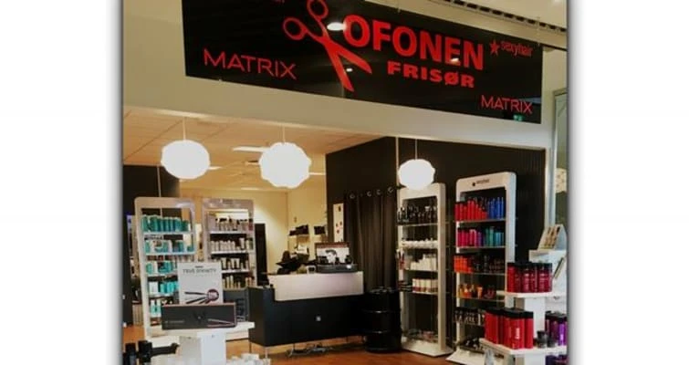 Saksofonen Frisør logo